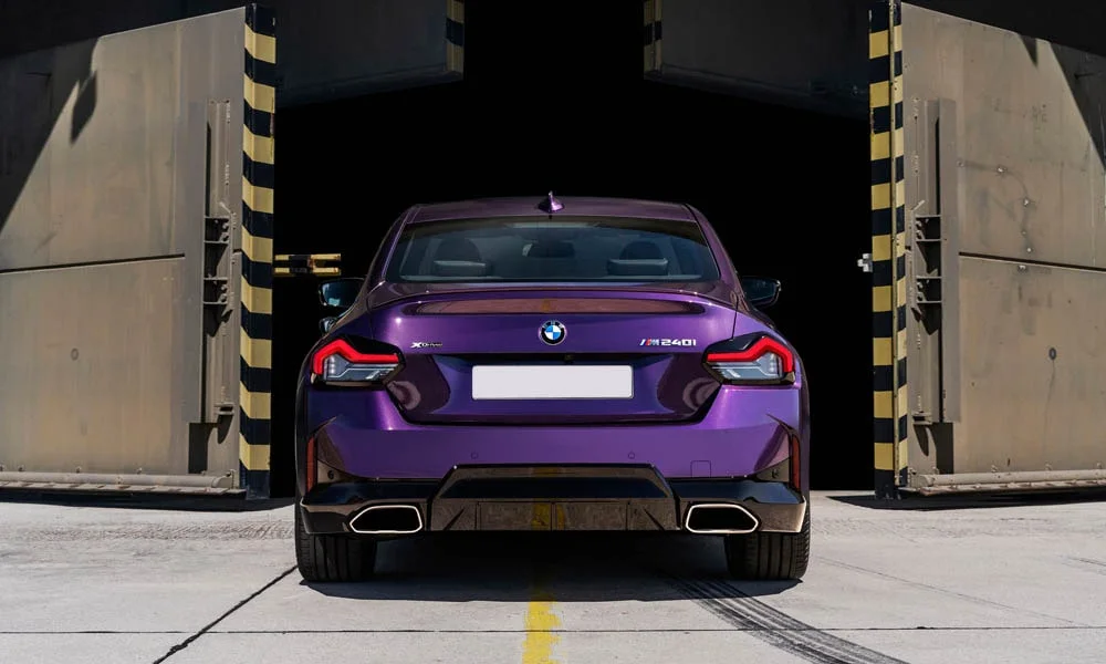 Фото BMW 2 серии — вид сзади, фото 8. Графика фонарей, бампер и оформление пятой двери. Насадки выхлопа или их имитация внизу бампера различают версии BMW 2 серии — вид сзади, фото 8