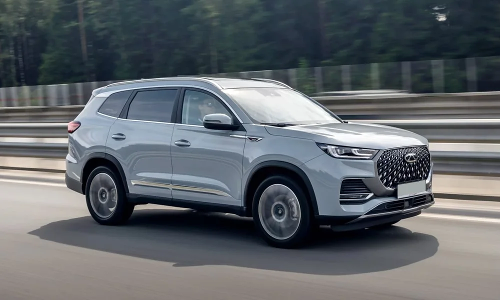 Фото Chery Tiggo 8 Pro Max (2022) — вид спереди, фото 4. Анфас: пропорции капота, посадка кузова и графика ходовых огней Chery Tiggo 8 Pro Max (2022) — вид спереди, фото 4