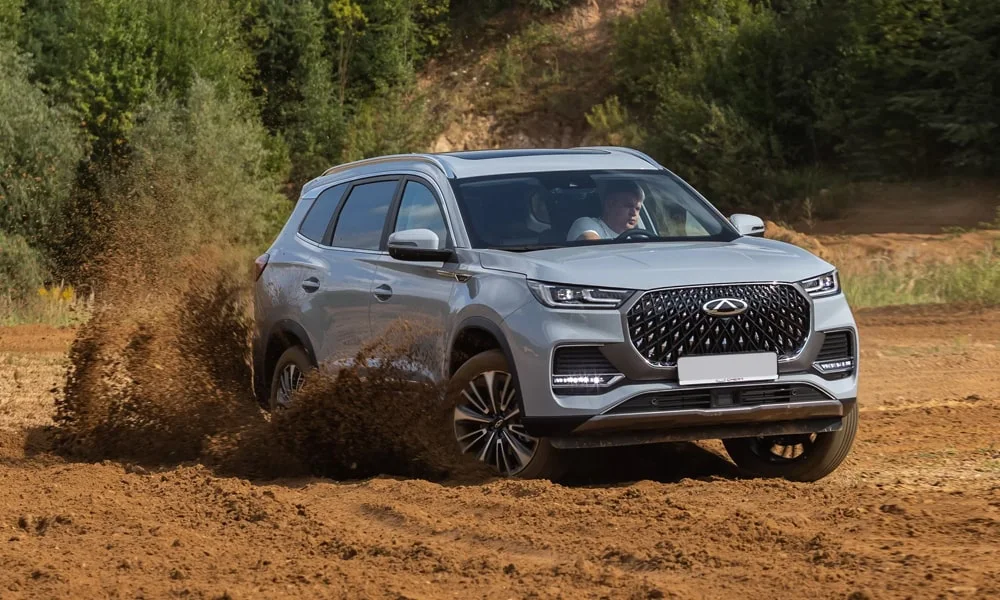 Фото Chery Tiggo 8 Pro Max (2022) — вид спереди, фото 10. Оптика, решётка и бампер — первое впечатление о модели. Дневные ходовые огни включаются автоматически с запуском Chery Tiggo 8 Pro Max (2022) — вид спереди, фото 10
