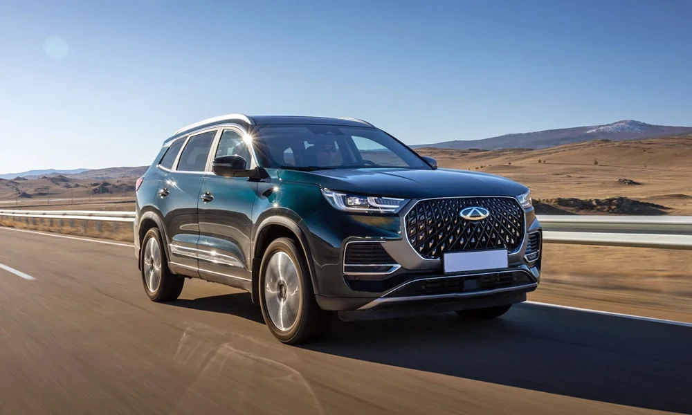 Фото Chery Tiggo 8 Pro Plug-in Hybrid (2023) — вид спереди, фото 5. Анфас: пропорции капота, посадка кузова и графика ходовых огней Chery Tiggo 8 Pro Plug-in Hybrid (2023) — вид спереди, фото 5