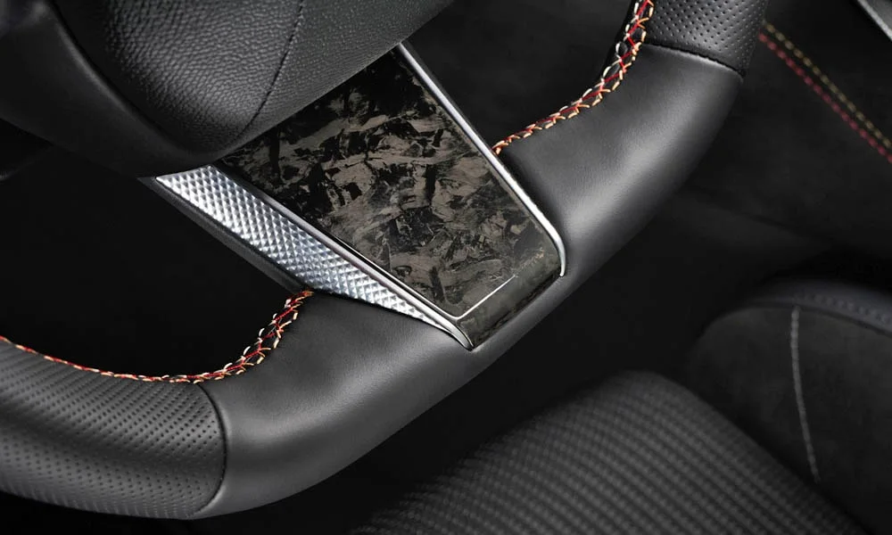 Фото Citroen DS 4 — руль. Обшивка обода и компоновка спиц крупным планом Citroen DS 4 — руль