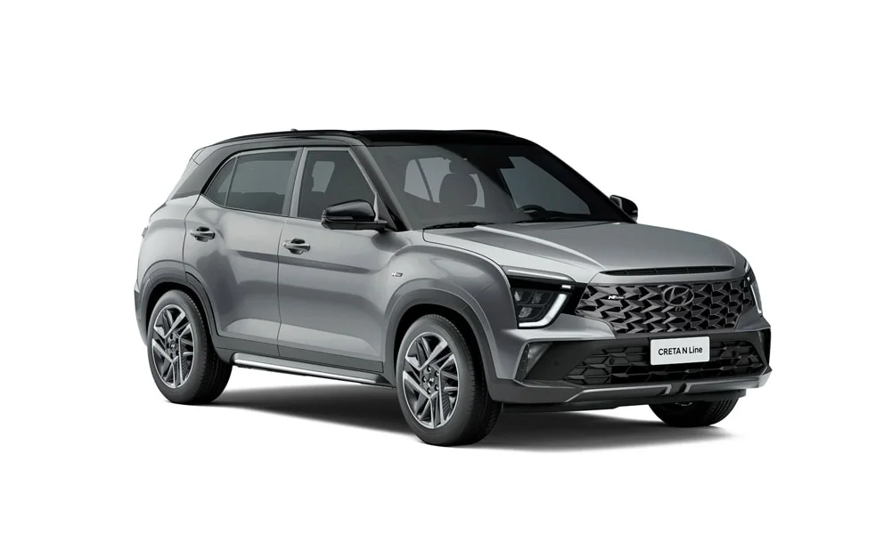 Фото Hyundai Creta N Line (2024) — вид спереди, фото 5. Кузов в сером цвете: рисунок оптики и решётки задаёт узнаваемое «лицо» модели. Дневные ходовые огни включаются автоматически с запуском Hyundai Creta N Line (2024) — вид спереди, фото 5