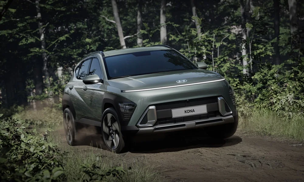 Фото Hyundai Kona — вид спереди, фото 9. Кузов в зелёном цвете: рисунок оптики и решётки задаёт узнаваемое «лицо» модели Hyundai Kona — вид спереди, фото 9