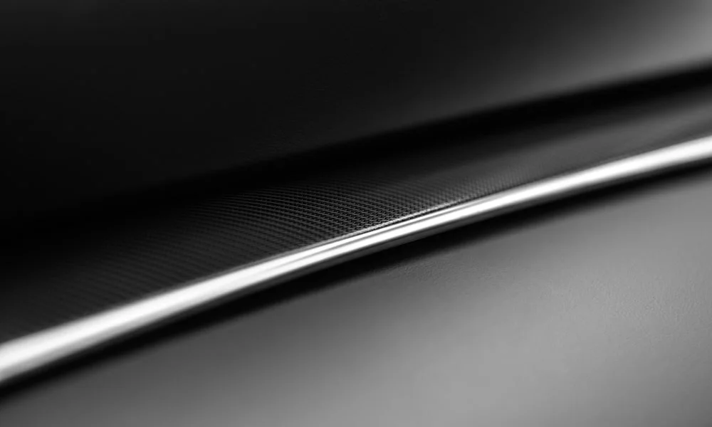 Фото Infiniti QX50 (2024) — деталь интерьера, фото 2. Элемент отделки вблизи. Мелкие элементы отделки честнее всего показывают класс салона Infiniti QX50 (2024) — деталь интерьера, фото 2