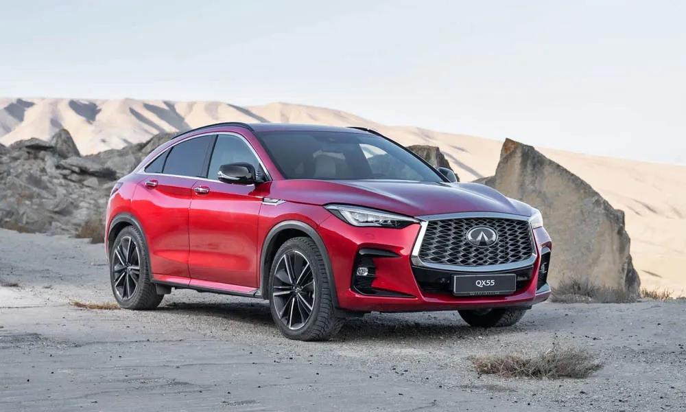 Фото Infiniti QX55 — вид спереди, фото 9. Передок в красном исполнении — крупная светотехника и выразительный бампер Infiniti QX55 — вид спереди, фото 9
