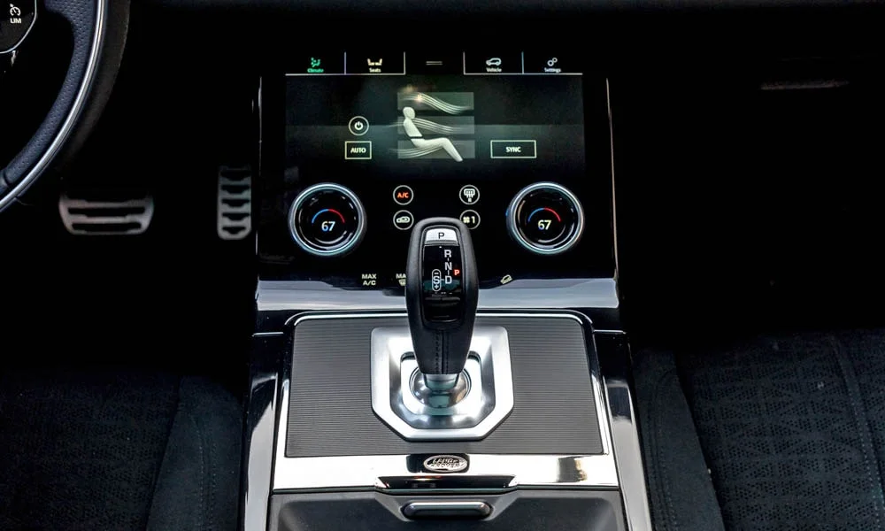 Фото Land Rover Land Rover Range Rover Evoque — селектор коробки передач. Управление коробкой: компактный селектор освобождает место на тоннеле Land Rover Land Rover Range Rover Evoque — селектор коробки передач
