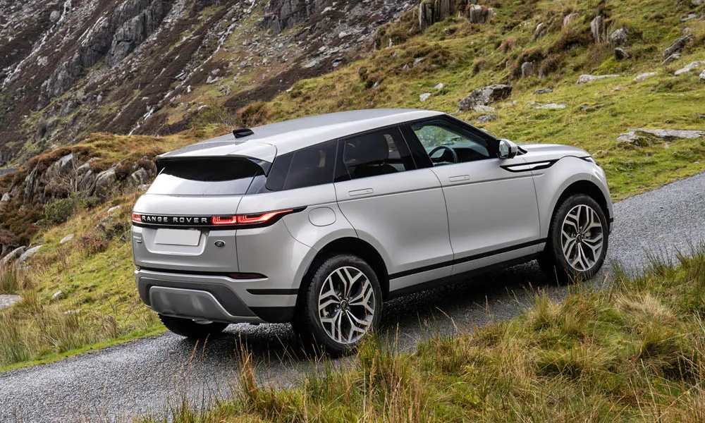 Фото Land Rover Land Rover Range Rover Evoque — вид сзади, фото 9. Графика фонарей, бампер и оформление пятой двери. Насадки выхлопа или их имитация внизу бампера различают версии Land Rover Land Rover Range Rover Evoque — вид сзади, фото 9
