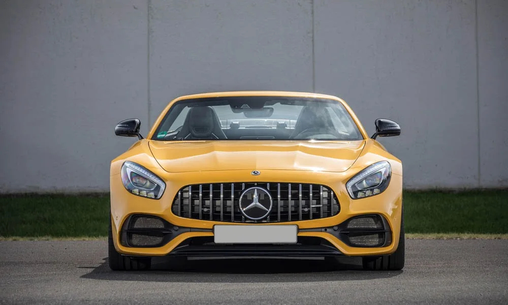 Фото Mercedes-Benz AMG GT — вид спереди, фото 28. Оптика, решётка и бампер — первое впечатление о модели. Дневные ходовые огни включаются автоматически с запуском Mercedes-Benz AMG GT — вид спереди, фото 28