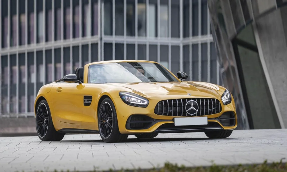 Фото Mercedes-Benz AMG GT — вид спереди, фото 29. Оптика, решётка и бампер — первое впечатление о модели. Рисунок ходовых огней — подпись модели, по нему её узнают в потоке Mercedes-Benz AMG GT — вид спереди, фото 29