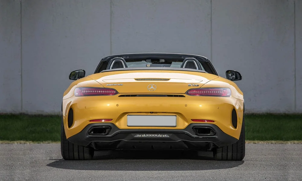 Фото Mercedes-Benz AMG GT — вид сзади, фото 23. Графика фонарей, бампер и оформление пятой двери. Насадки выхлопа или их имитация внизу бампера различают версии Mercedes-Benz AMG GT — вид сзади, фото 23