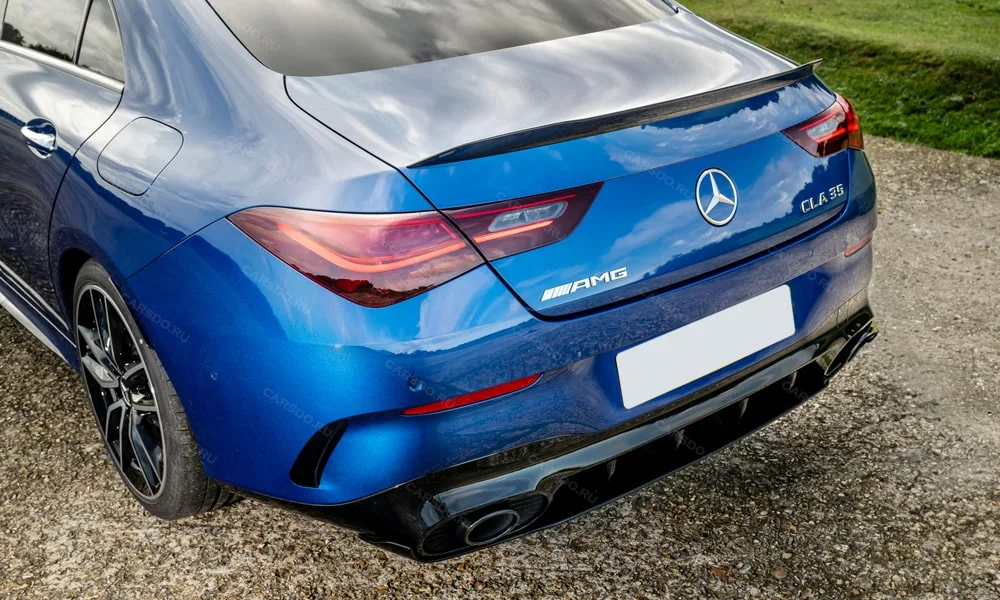 Фото Mercedes-Benz CLA (2024) — вид сзади, фото 5. Графика фонарей, бампер и оформление пятой двери Mercedes-Benz CLA (2024) — вид сзади, фото 5