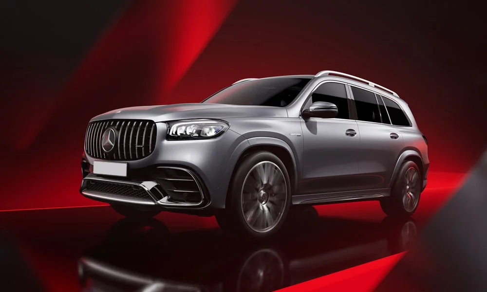 Фото Mercedes-Benz GLS (2024) — вид спереди, фото 6. Оптика, решётка и бампер — первое впечатление о модели. Рисунок ходовых огней — подпись модели, по нему её узнают в потоке Mercedes-Benz GLS (2024) — вид спереди, фото 6