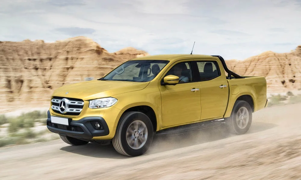 Фото Mercedes-Benz X-Class — вид спереди, фото 11. Анфас: пропорции капота, посадка кузова и графика ходовых огней. Дневные ходовые огни включаются автоматически с запуском Mercedes-Benz X-Class — вид спереди, фото 11