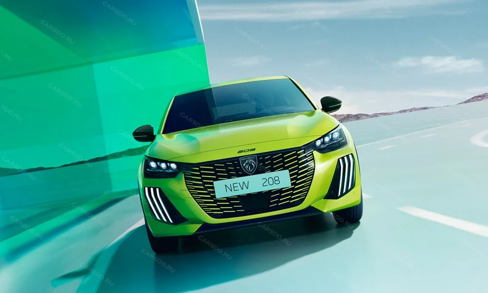 Фото Peugeot 208 — вид спереди, фото 4. Кузов в зелёном цвете: рисунок оптики и решётки задаёт узнаваемое «лицо» модели. Рисунок ходовых огней — подпись модели, по нему её узнают в потоке Peugeot 208 — вид спереди, фото 4