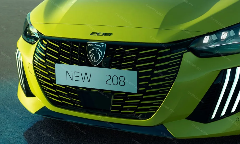 Фото Peugeot 208 — решётка радиатора. Фирменный рисунок облицовки — визитная карточка марки Peugeot 208 — решётка радиатора