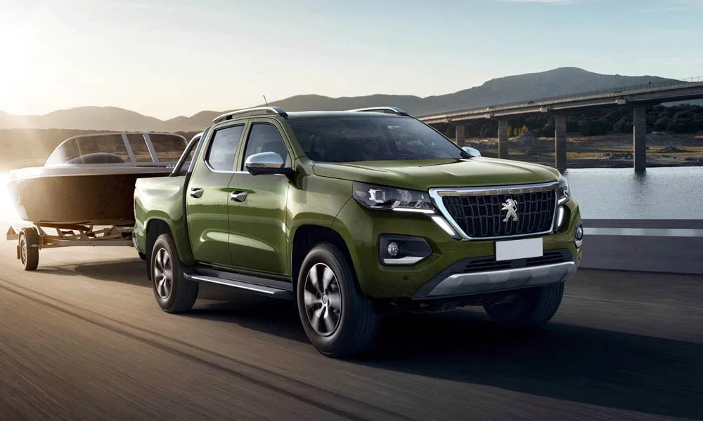 Фото Peugeot Landtrek (2024) — вид спереди, фото 12. Оптика, решётка и бампер — первое впечатление о модели Peugeot Landtrek (2024) — вид спереди, фото 12