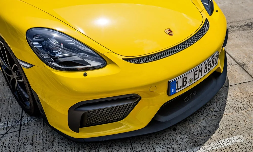 Фото Porsche 718 Cayman GT4 — вид спереди, фото 9. Оптика, решётка и бампер — первое впечатление о модели Porsche 718 Cayman GT4 — вид спереди, фото 9