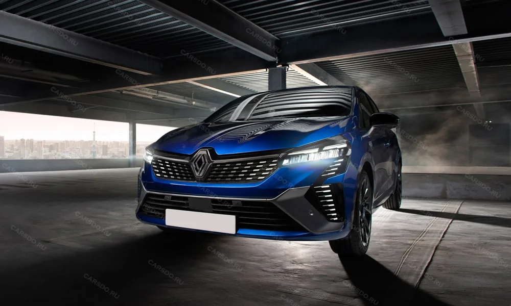 Фото Renault Clio RS — вид спереди, фото 5. Кузов в синем цвете: рисунок оптики и решётки задаёт узнаваемое «лицо» модели Renault Clio RS — вид спереди, фото 5