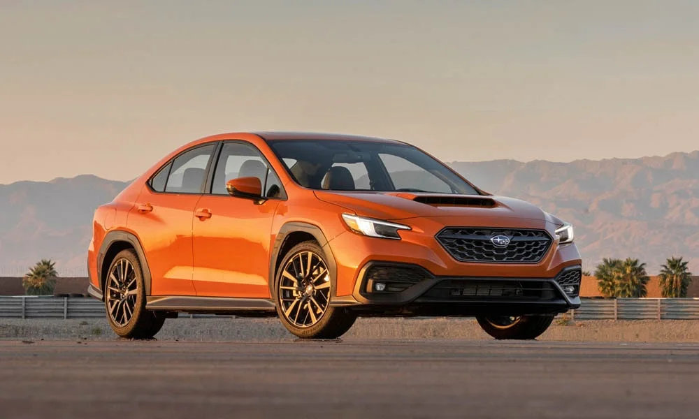 Фото Subaru WRX STI (2024) — вид спереди, фото 6. Оптика, решётка и бампер — первое впечатление о модели. Рисунок ходовых огней — подпись модели, по нему её узнают в потоке Subaru WRX STI (2024) — вид спереди, фото 6
