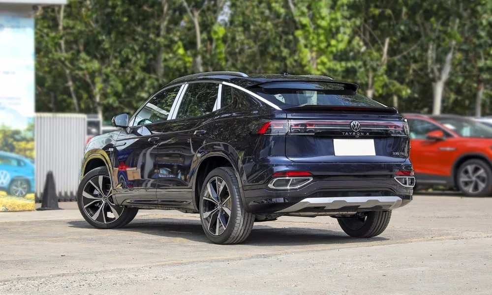 Фото Volkswagen Tayron X — вид сзади, фото 5. Графика фонарей, бампер и оформление пятой двери Volkswagen Tayron X — вид сзади, фото 5