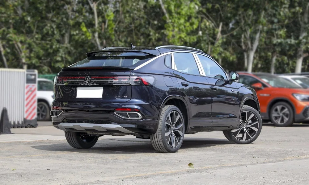 Фото Volkswagen Tayron X — вид сзади, фото 6. Графика фонарей, бампер и оформление пятой двери Volkswagen Tayron X — вид сзади, фото 6