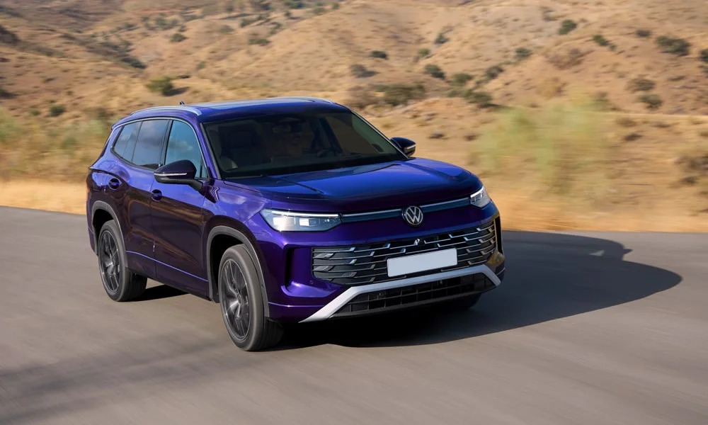 Фото Volkswagen Tayron (2024) — вид спереди, фото 4. Оптика, решётка и бампер — первое впечатление о модели Volkswagen Tayron (2024) — вид спереди, фото 4